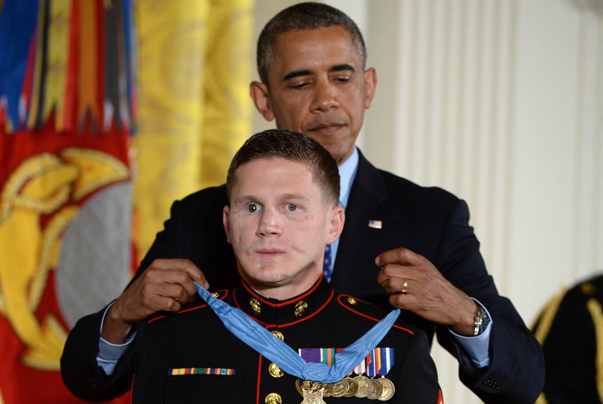 A brave Marine who gets the Medal of Honor for jumping on a grenade to save a fellow soldier