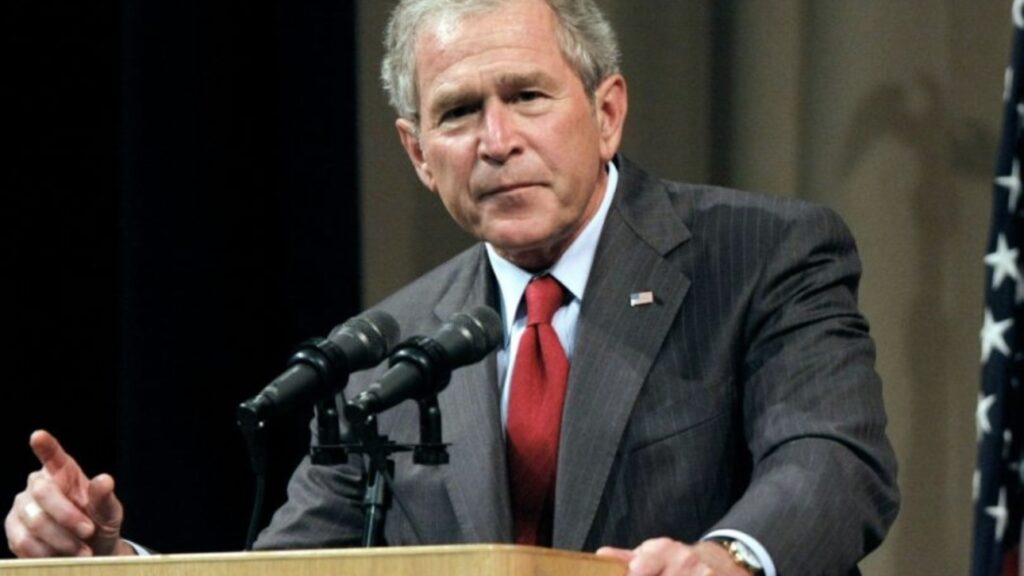 George W. Bush greets his grandchild